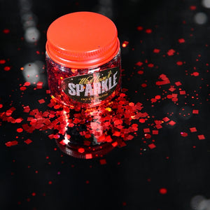 pot of red glitter sprinkled on a surface
