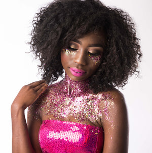 woman wearing hot pink glitter with matching sequin top