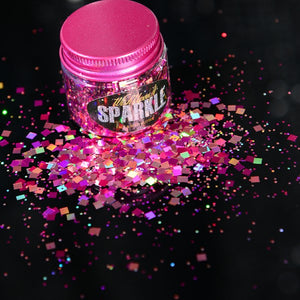 hot pink face glitter pot sprinkled on a surface