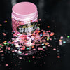 pot of pale pink glitter sprinkled on surface