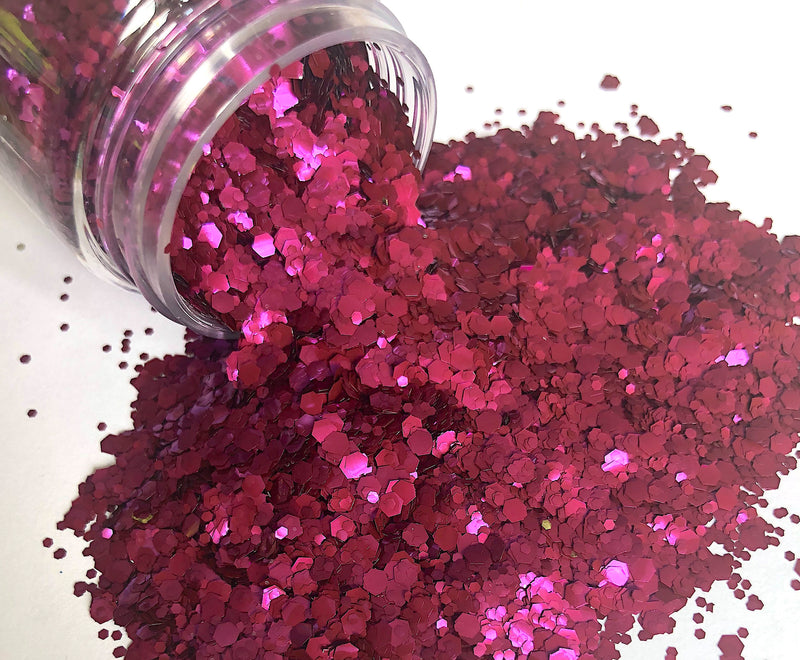 Purple biodegradable glitter pouring out of pot