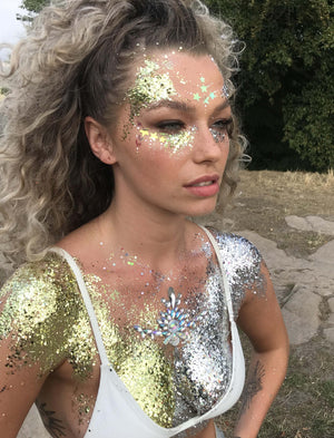 Silver biodegradable glitter on girls body and face