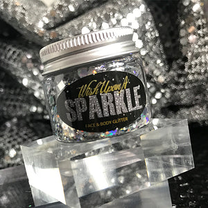 silver face glitter pot on a glass stand 