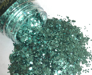 Turquoise Biodegradable Glitter pouring out of pot